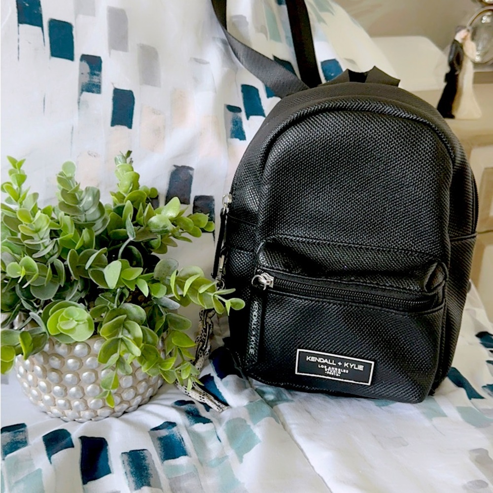 Mini back pack, very beautiful little use is like new